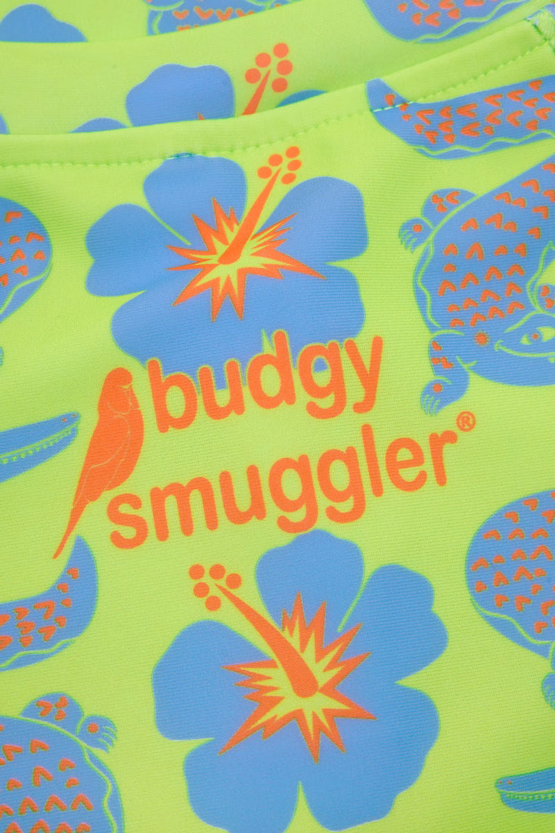 Close up of the Trop a Croc crocodile and hibiscus print with Budgy Smuggler logo
