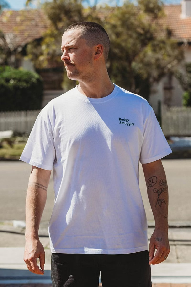 white tee shirt with green detailing on man